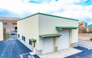 東京鐵鋼株式会社 八戸工場 圧延棟誘導倉庫