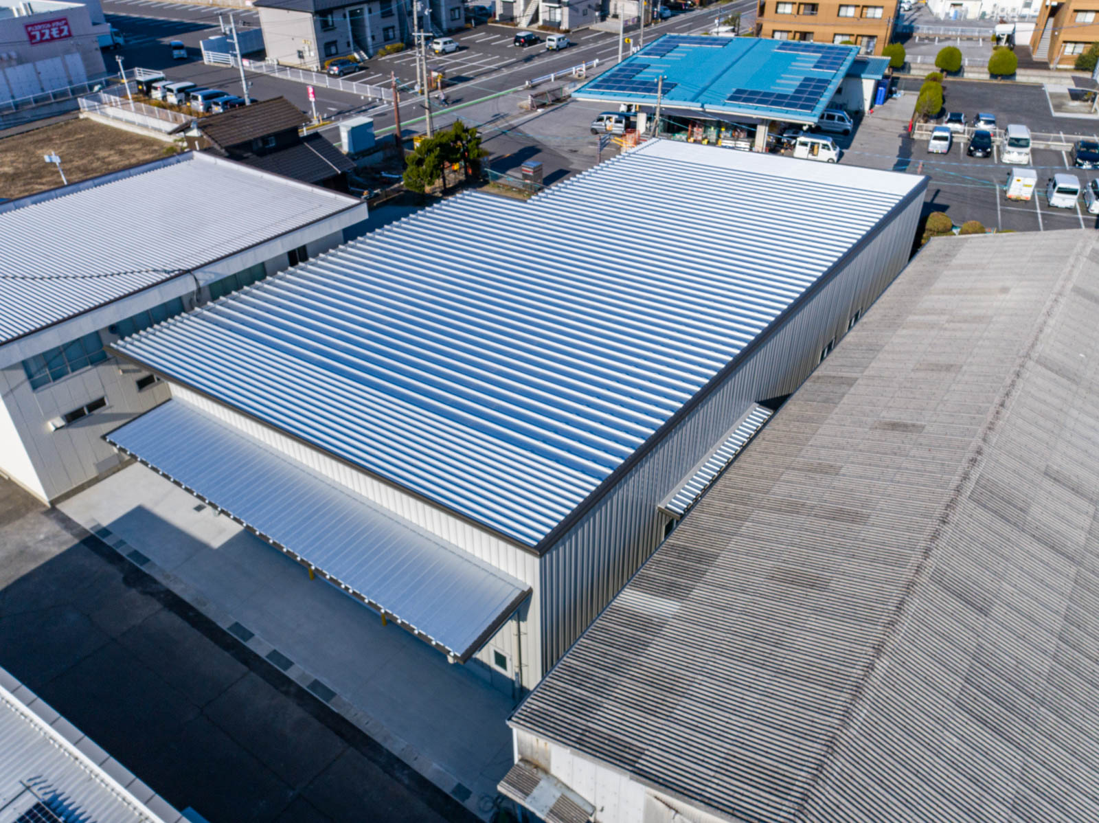 滋賀麻工業株式会社 本社工場新倉庫棟 - システム建築実績No.1 横河ブリッジシステム建築